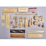 Miscellaneous bone and ivory works of art and objects, 19th c, to include two spinning tops and an