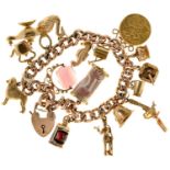 A gold charm bracelet, the charms including half sovereign 1911, 40g Most of the charms in good