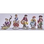 Five Sitzendorf figures of children, mid 20th c, in 18th c style, 12cm h and circa Base of boy