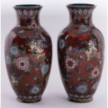 A pair of Japanese cloisonné enamel vases, Meiji period, with phoenix and stylised flowers, on