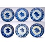 A set of six Chinese export blue and white plates, late 18th c, painted with flowers in linked