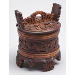 Norwegian Folk Art. A carved wood butter box and cover with two birch bands, late 19th / early
