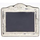 An Elizabeth II silver photograph frame, stamped with husks, 13.5 x 15.5cm, maker R C, Sheffield
