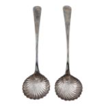 A pair of George III silver sauce ladles, Old English pattern with shell bowl, by Hester Bateman,