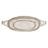 Liberty & Co. An Arts and Crafts miniature oval silver dish, with pierced handles, 13.5cm l, mark of