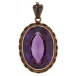 A synthetic colour change sapphire pendant, in gold, 4.3g, Good condition