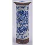 A Chinese cylindrical crackle glaze dragons and peonies vase, with carved, brown glazed borders,
