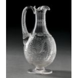 An English 'brilliant' cut glass water jug, c1900, with palmettes and swags, 18.5cm h and a French