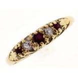 A ruby and diamond ring, in 18ct gold, 2.1g, size N Light wear
