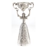 A German silver wager cup, early 20th c, in the form of a lady, 26cm h, crescent and crown control