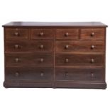A Victorian mahogany double chest of drawers, late 19th c, fitted four short and eight graduated