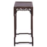 A Chinese hardwood stand, 19th / early 20th c, the moulded square top with pierced frieze, the