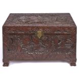 A Chinese carved camphor wood chest, second half 20th c, with carved handles and feet, 57cm h; 51