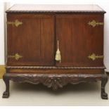 A Victorian mahogany cabinet on stand, c1900,  with gadroon moulding, the upper part enclosed by a