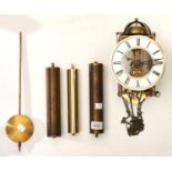 A Kundo reproduction brass and metal lantern clock, 21cm h and another, pendulum and weights