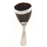 A silver mounted nut scoop, 19th c, with associated earlier silver handle Light wear, no splits