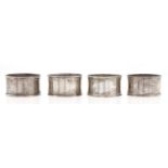 A set of four George V silver napkin rings, by  J & R Griffin, Chester 1913 and 1914, 1oz 11dwts (