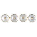 A pair of pearl, mother of pearl and gold cufflinks, early 20th c, 14mm diam, marked 18, 6.9g Slight