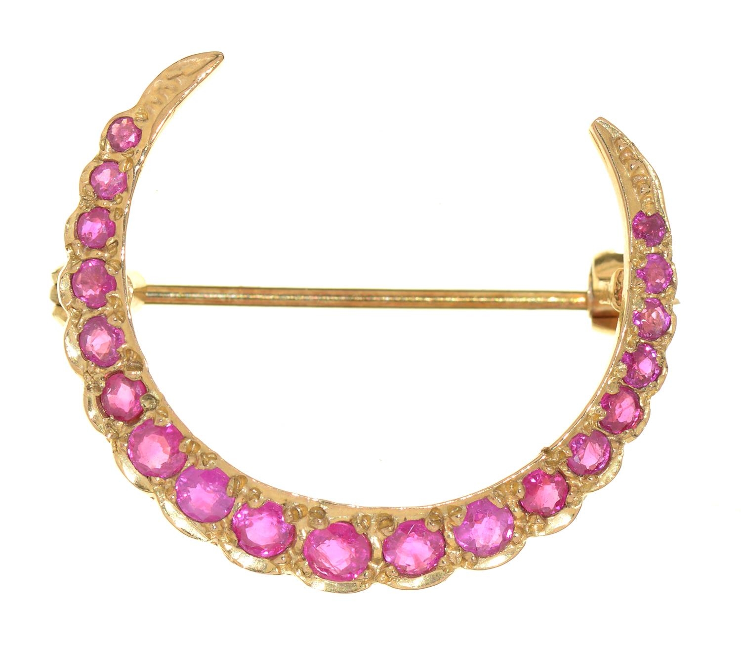A ruby crescent brooch in Victorian style, in 9ct gold, 27mm, maker HBJ, London 2007, 3.3g Good