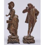 A pair of French fin de siecle bronzed spelter statuettes of a lady and gallant, c1900, 26cm h