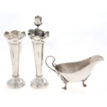A George V silver sauceboat, on three hoof feet, 16cm l, by James Dixon & Sons, Sheffield 1935, a