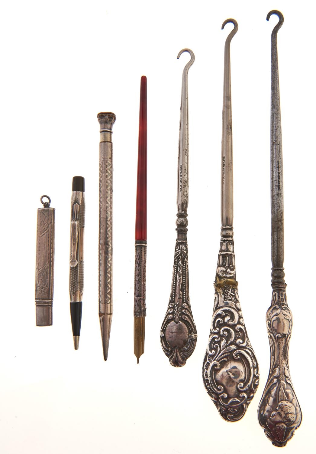 Three silver handled button hooks, various lengths, makers and dates, c1900, two pencils, the sheath