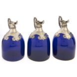 A set of three Victorian blue glass spirit flasks, engraved BRANDY, GIN and WHISKY, c1880, 17cm h