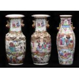 One and a pair of Chinese Canton famille rose vases, second half 19th c, of club or slender