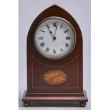 An Edwardian mahogany and inlaid lancet arched mantel timepiece, with French movement, 22.5cm h,