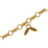A gold bracelet, early 20th c, 20cm excluding two detached links, unmarked, 11.1g Worn