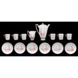 A Royal Doulton bone china Vista pattern coffee service, c1930, transfer printed in red with