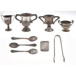 Four miniature silver trophy cups, various sizes, makers and dates, early 20th c, a set of three