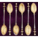 A set of six Victorian parcel gilt silver coffee spoons, with baluster stem and ball end, by C T & G