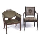 A Japanned elbow chair with caned back, early 20th c, in Regency style, on turned legs, seat