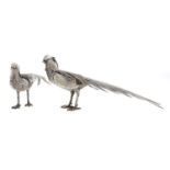 A pair of Spanish silver gilt pheasant table ornaments, mid 20th c, 25.5cm l, indistinct maker's and