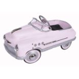 A pink painted steel child's pedal car, 1950's style, 97cm l Small areas of rust and some