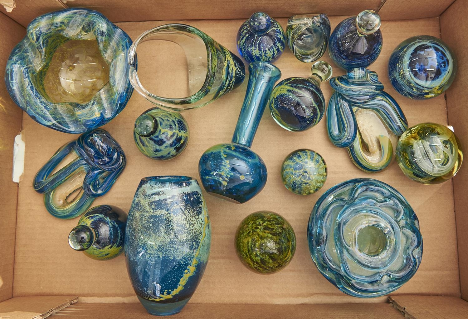 Seventeen Mdina glass vases, paperweights and objects, largest vase 17.5cm h, mostly engraved