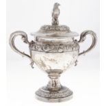 An Italian shield shaped silver cup and cover, early 19th c, chased with bands of flowers and