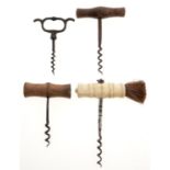 A Victorian straight pull corkscrew, the plated steel shaft and wire worm, bone handle and brush,