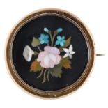 A pietre dure brooch, c1870, with rose centred group of flowers, mounted in gold at later date, 35mm
