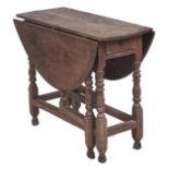 An oak gateleg table, 19th c, 72cm h; 91 x 109cm Faded / water stains and shrinkage cracks to top