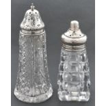 An Edwardian silver mounted cut glass sugar caster and cover, 17cm h, marks rubbed, London 1904