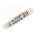 A diamond five stone ring, in white gold, marked 18K, 3.3g, size H Light wear scratches