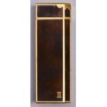 A Cartier gold plated and faux tortoiseshell cigarette lighter, No G78017 Light wear scratches