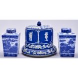 A pair of blue printed earthenware tea caddies and covers for Ringtons Ltd Tea Merchants, early 20th