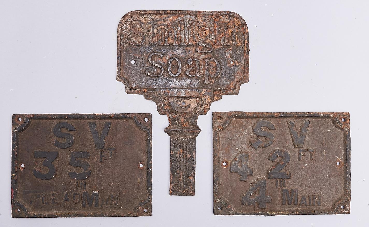 Advertising. The upper part of a Victorian cast iron umbrella stand, late 19th c, inscribed Sunlight