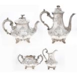A Victorian silver tea and coffee service, of baluster form and crisply chased with flowers and