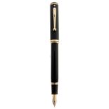 A Shaeffer black lacquer fountain pen, Connoisseur, with gold nib marked 18K 750 Good condition