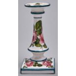 A Wemyss ware candlestick, c1900, painted with roses, 17.5cm h, impressed WEMYSS Professional