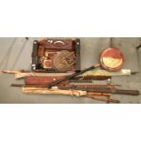 A collection of vintage and modern fishing rods, reels and other angling accessories, and a